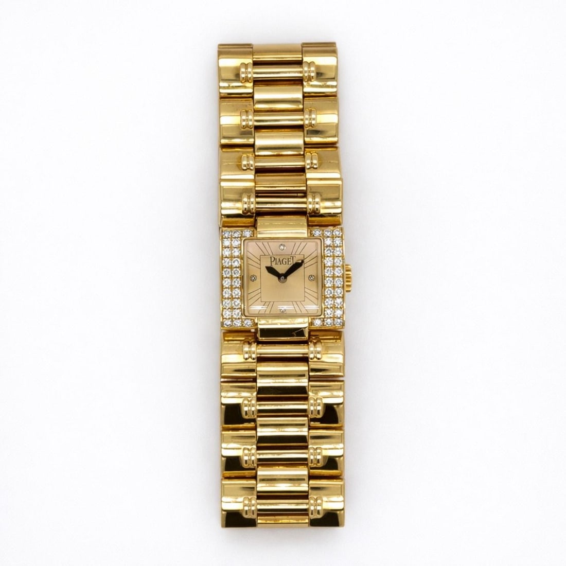 Dancer Quartz Watch in 18K Yellow Gold with Diamonds by Piaget: Dancer Quartz Watch in 18K Yellow Gold with Diamonds by Piaget This Piaget Dancer watch is crafted from 18K yellow gold and features a quartz movement. The watch is fully linked and set with 48 origin