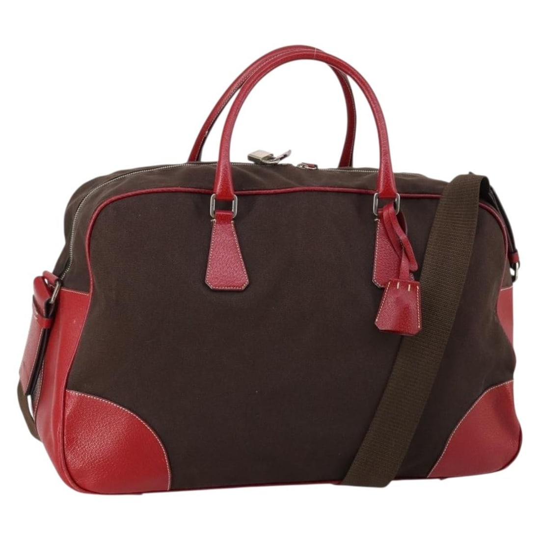 Prada Brown Canvas Bowler Handbag with Leather Accents 47cm: Prada Brown Canvas Bowler Handbag with Leather Accents 47cm This Prada Bowler Bag is crafted from brown canvas with leather accents, designed for women. The bag features a spacious interior and durabl