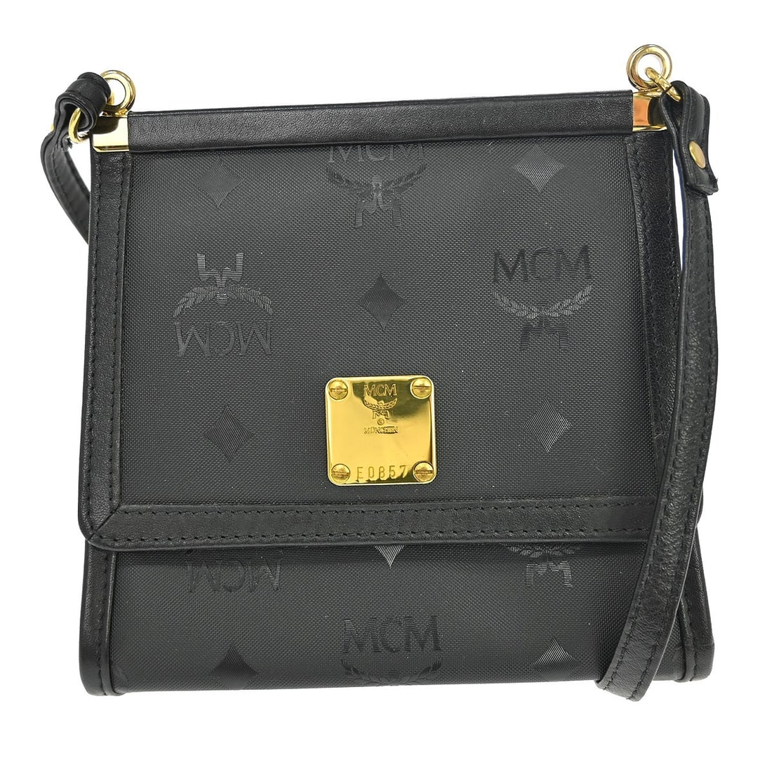 MCM Vintage Black Leather Crossbody Shoulder Bag for Women: MCM Vintage Black Leather Crossbody Shoulder Bag for Women This vintage MCM black shoulder bag is crafted from leather and features a crossbody strap. Designed for women, it is suitable for casual out
