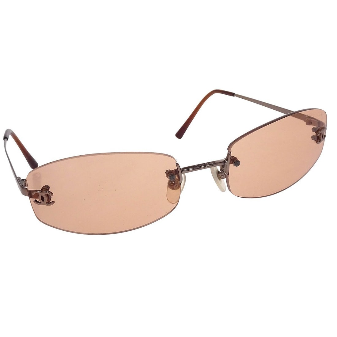 Chanel CC Logos Brown Acrylic Sunglasses with Orange Lenses for Women: Chanel CC Logos Brown Acrylic Sunglasses with Orange Lenses for Women These Chanel sunglasses feature a brown acrylic frame with orange acrylic lenses, designed for women. The sunglasses are styled wi