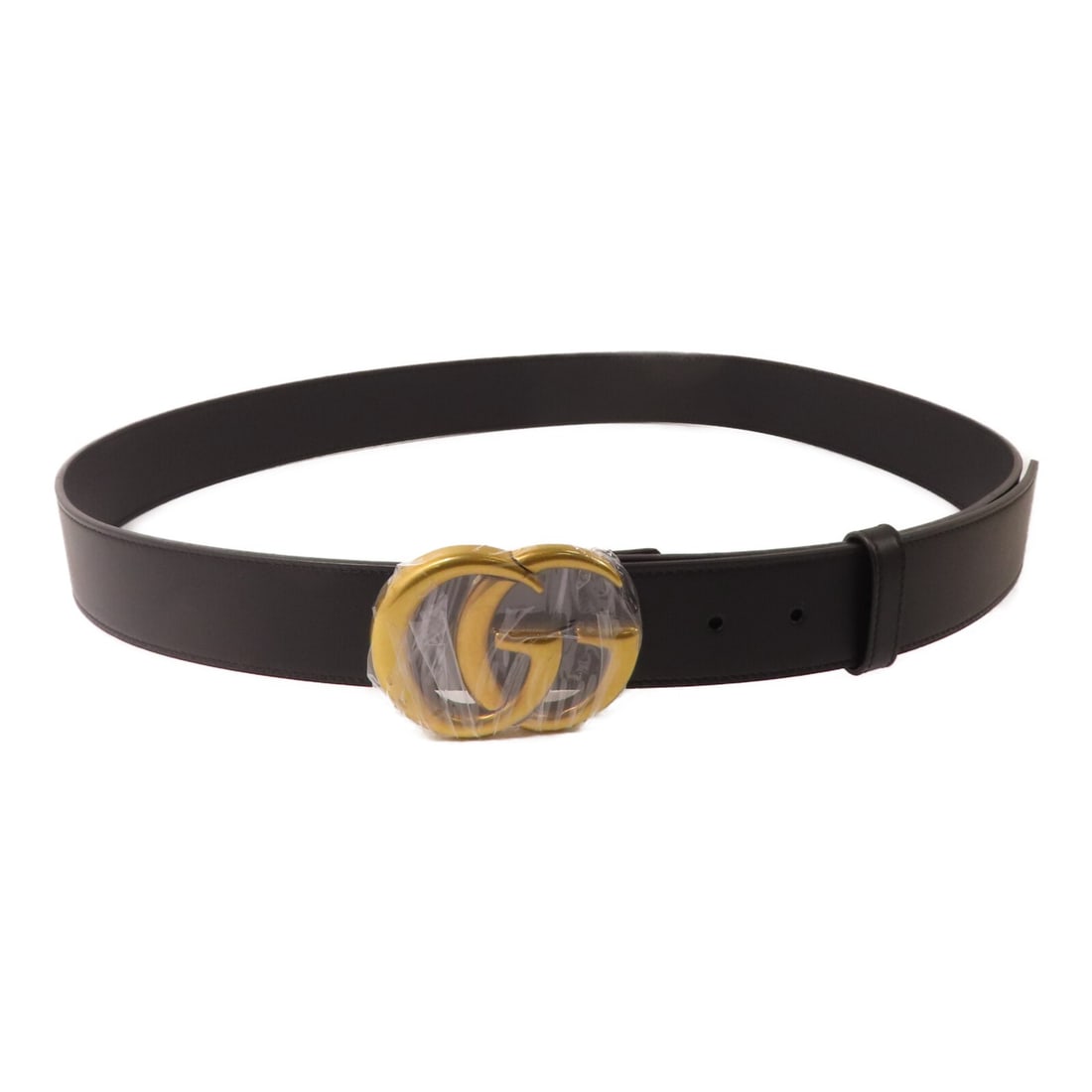 Black Calfskin GG Belt by Gucci with Gold Hardware Size 115: Black Calfskin GG Belt by Gucci with Gold Hardware Size 115 This un-used Gucci belt is crafted from black calfskin leather and features a GG gold-tone buckle. Made in Italy, it offers a regular fit an