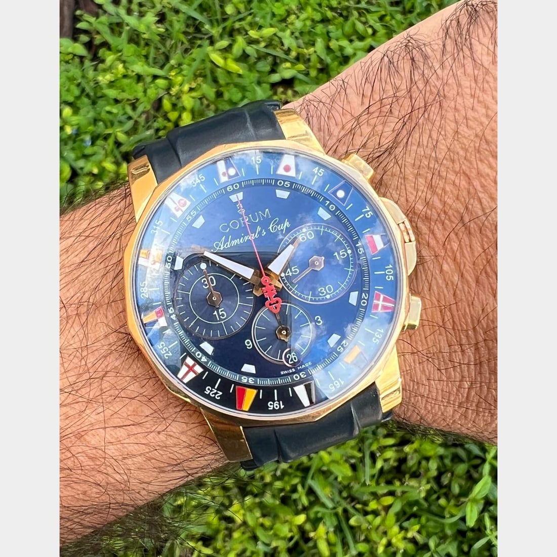 CORUM Admirals Cup 18K Yellow Gold Automatic Watch: CORUM Admirals Cup 18K Yellow Gold Automatic Watch This stunning CORUM Admirals Cup watch is crafted from 18K yellow gold, weighing an impressive 196.6 grams. It features an automatic movement, ensuri