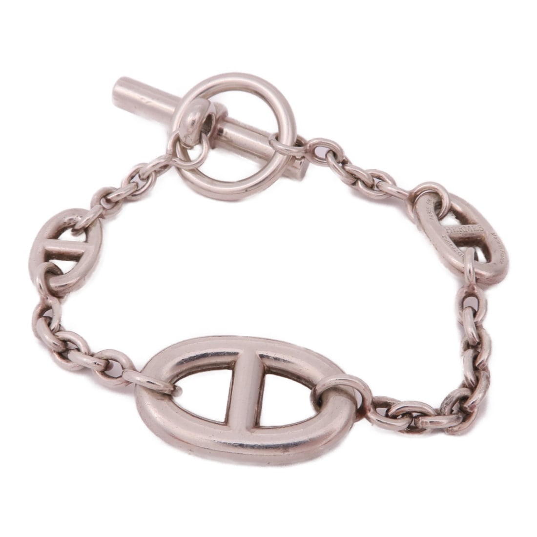 Hermes Farandole 925 Silver French Bracelet: Hermes Farandole 925 Silver French Bracelet This Hermes Farandole bracelet is crafted from 925 sterling silver and features a classic silver tone. Designed without a main stone, it offers a timeless a