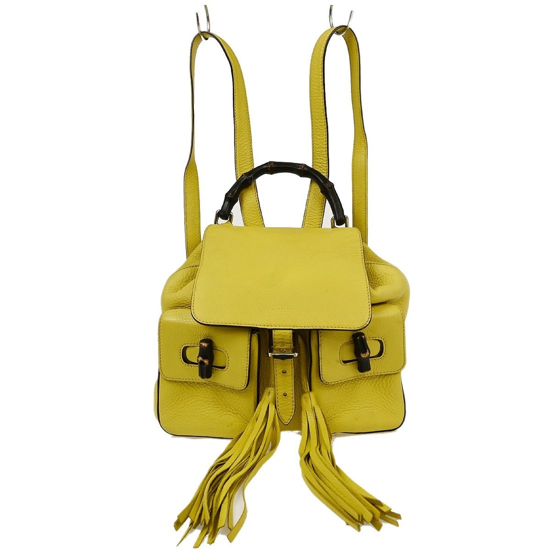 Gucci Bamboo Fringe Yellow Leather Backpack 370833 493075: Gucci Bamboo Fringe Yellow Leather Backpack 370833 493075 This vintage Gucci Backpack showcases a unique design with bamboo accents and a striking yellow leather exterior. Crafted in Italy, it feature