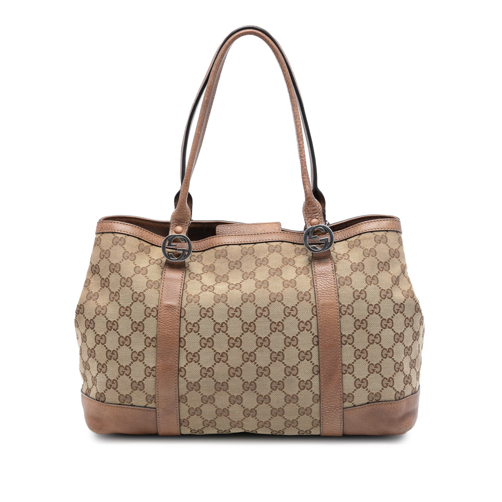 Beige GG Canvas Miss GG Tote Bag with Leather Trim by Gucci: Beige GG Canvas Miss GG Tote Bag with Leather Trim by Gucci The Gucci GG Canvas Miss GG Tote features a canvas body with leather trim, flat leather handles, and an open top with a magnetic snap closur