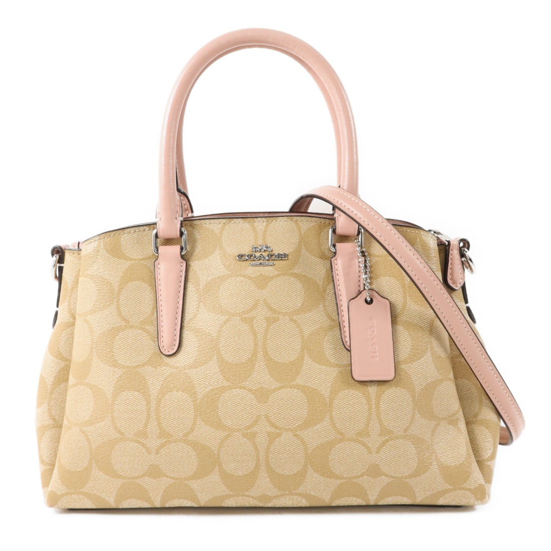 Coach Calfskin Brown Pink Convertible Shoulder Handbag: Coach Calfskin Brown Pink Convertible Shoulder Handbag This Coach 2-way shoulder bag is crafted from calfskin leather in a brown and pink color combination. The bag features a versatile design that al