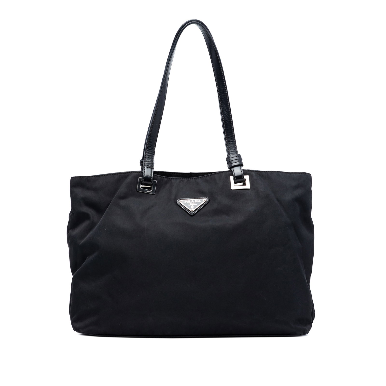 Black Nylon Tote Bag with Leather Trim Prada Tessuto Model: Black Nylon Tote Bag with Leather Trim Prada Tessuto Model This Prada Tessuto Tote features a black nylon body with leather trim and flat leather straps. The open top design provides easy access, whil