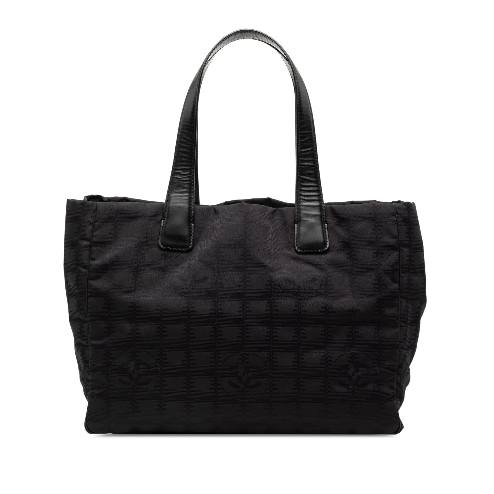 Chanel New Travel Line Black Nylon Tote Bag with Leather Trim: Chanel New Travel Line Black Nylon Tote Bag with Leather Trim This Chanel New Travel Line tote bag features a black nylon body with leather trim, flat leather straps, an open top, and interior zip poc