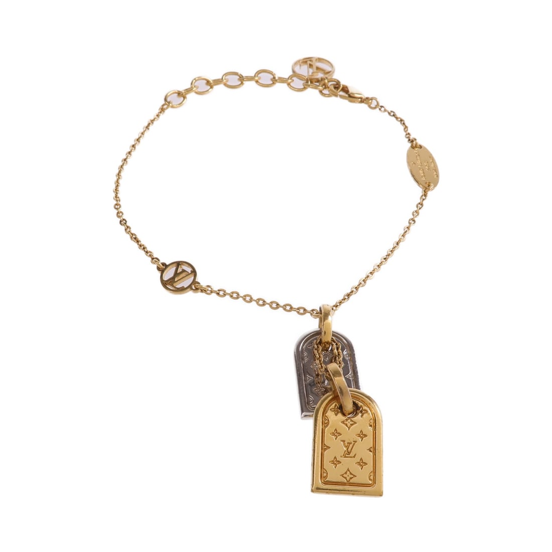 Nanogram Gold Tone Metal Bracelet by Louis Vuitton M63142 for Women: Nanogram Gold Tone Metal Bracelet by Louis Vuitton M63142 for Women This Louis Vuitton Nanogram bracelet features a stylish blend of gold and silver-toned metal. Designed for women, it showcases the b