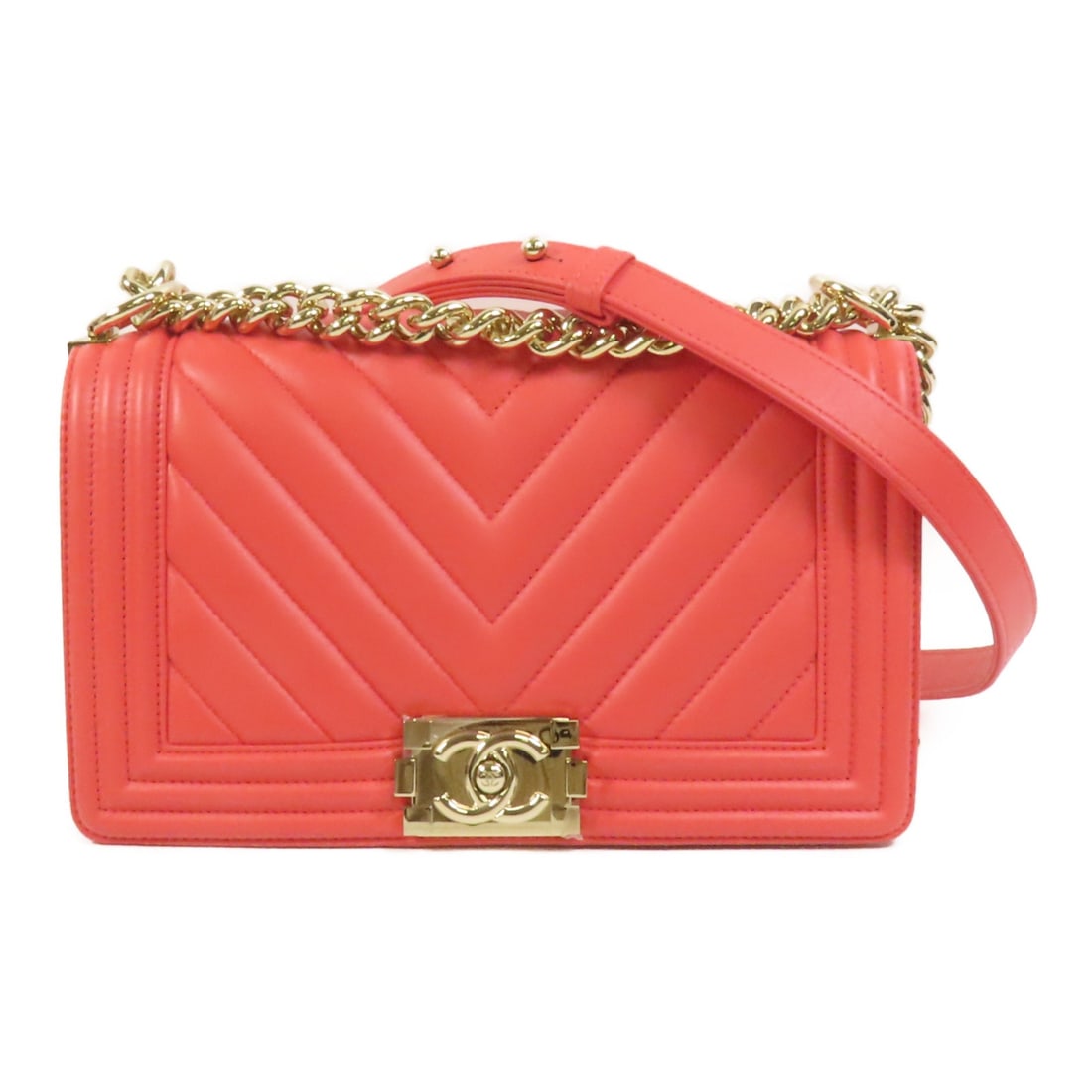 Red Lambskin CHANEL Boy 25 Shoulder Bag with CC Gold Hardware: Red Lambskin CHANEL Boy 25 Shoulder Bag with CC Gold Hardware This CHANEL Boy 25 chain shoulder bag features luxurious lambskin leather in a striking red color. The bag is crafted in France and includ