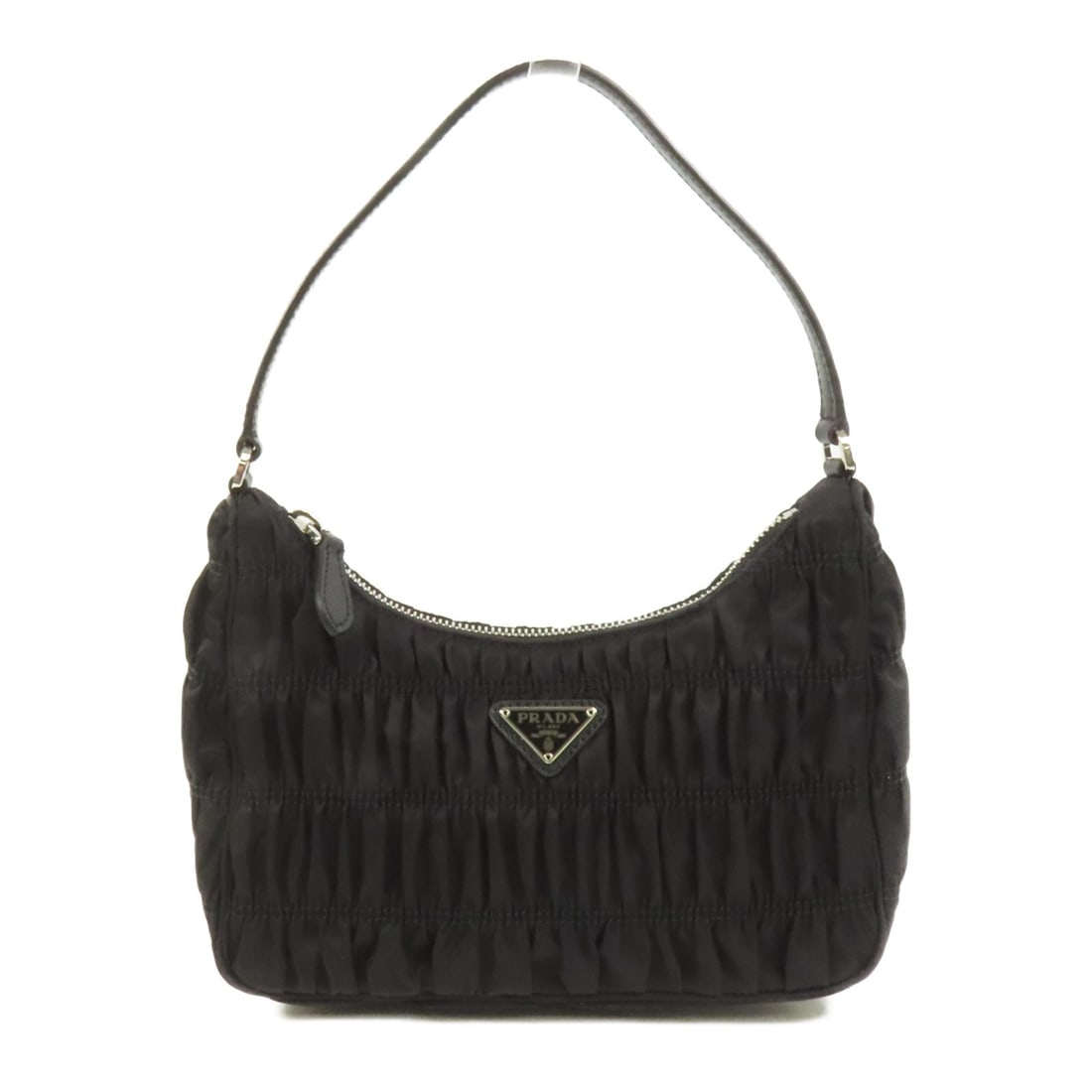 Prada Black Nylon Hobo Shoulder Bag with Silver Hardware: Prada Black Nylon Hobo Shoulder Bag with Silver Hardware This Prada shoulder bag features a sleek hobo design crafted from black nylon. Designed for women, it offers a practical and stylish option for