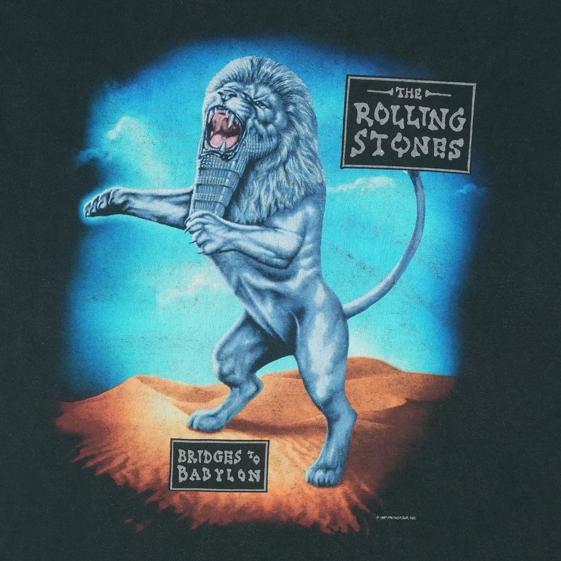 Vintage 1997 Bridges To Babylon Black Cotton XL Tour T-Shirt: Vintage 1997 Bridges To Babylon Black Cotton XL Tour T-Shirt This is an original vintage 1997 Rolling Stones Bridges To Babylon Tour Shirt. It features front and back graphics and is made of 100% cott