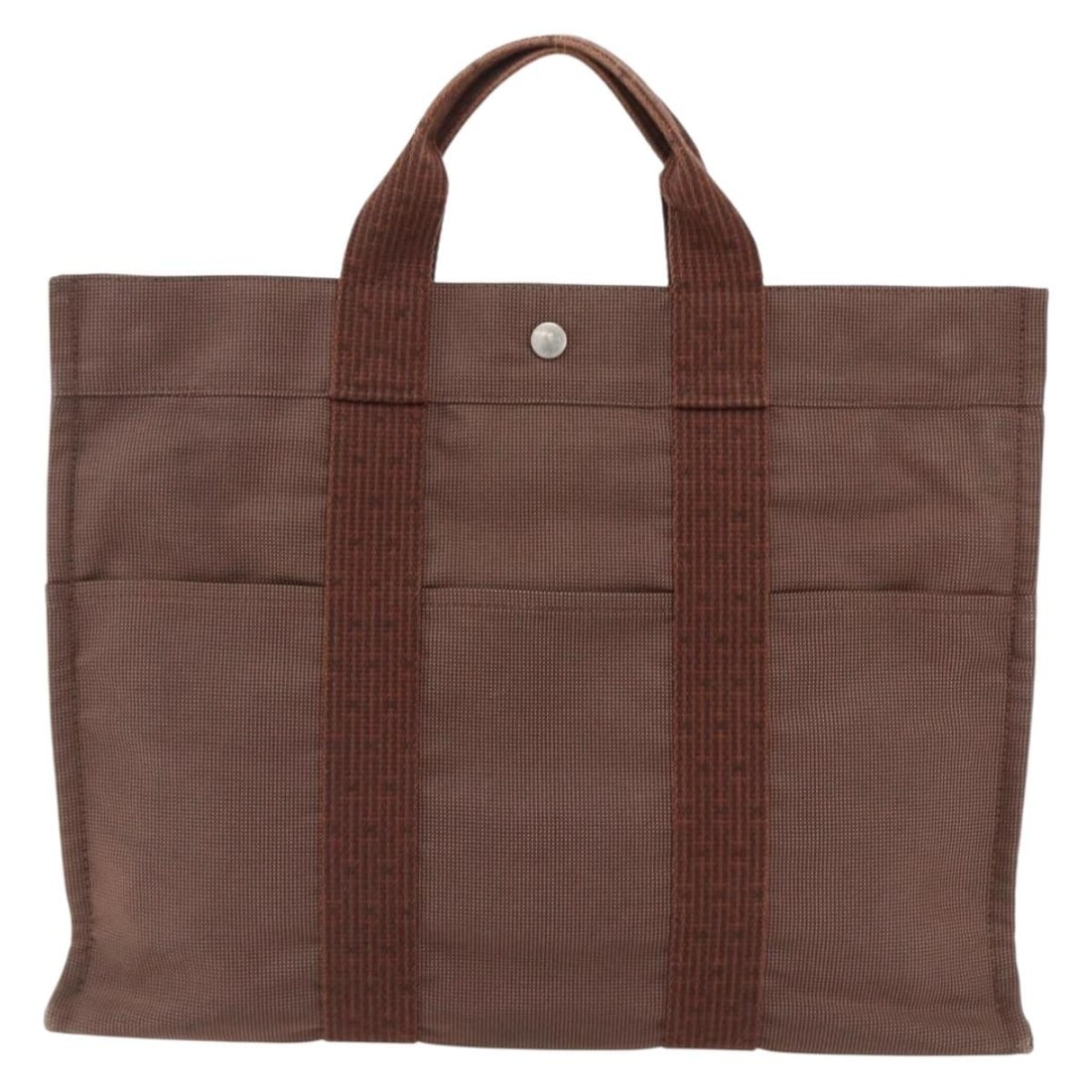 Hermes Herline Canvas Tote Bag Brown 42cm by 32cm by 10cm: Hermes Herline Canvas Tote Bag Brown 42cm by 32cm by 10cm This Hermes Fourre-tout Herline tote bag is crafted from brown canvas and designed for female use. It features a spacious interior with a pock