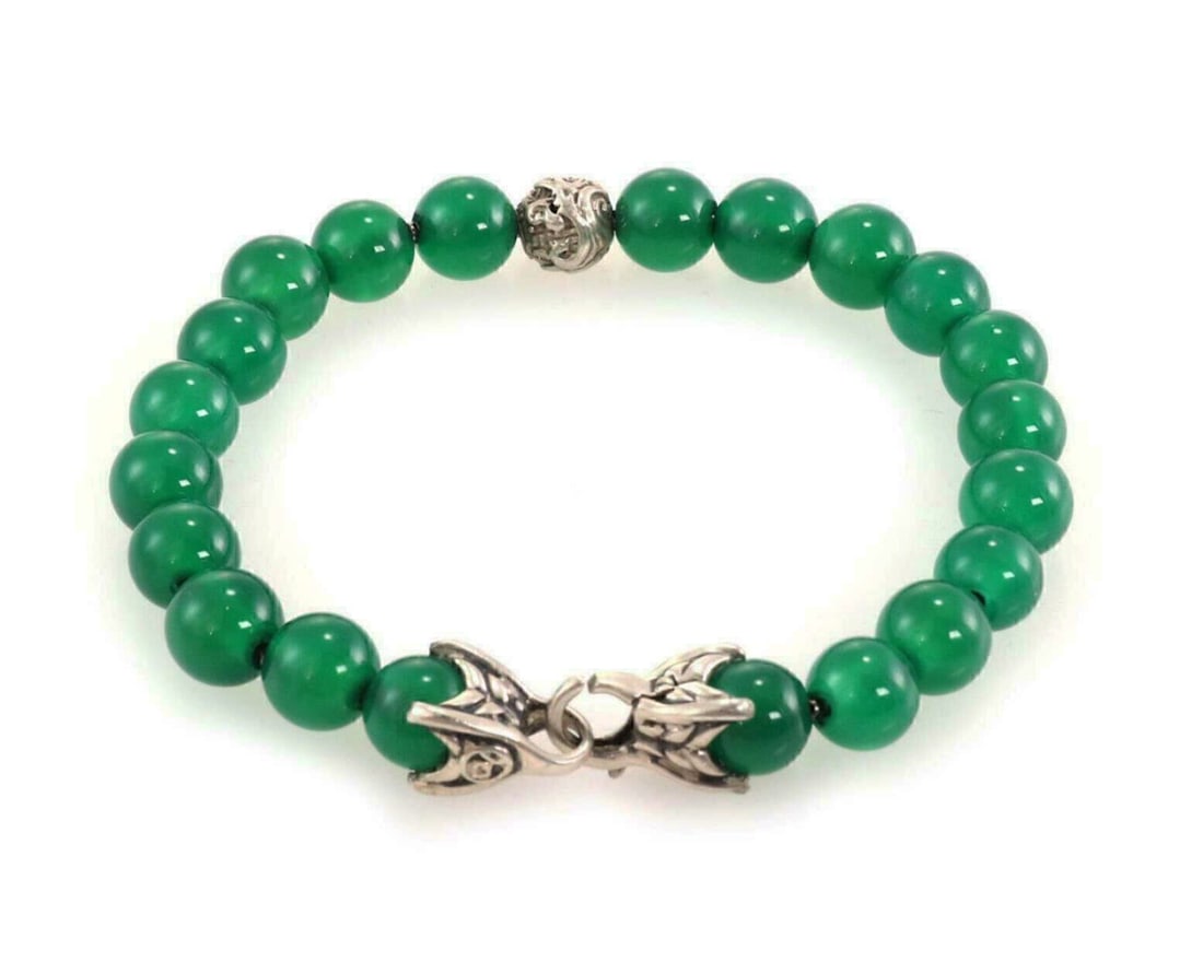 Beaded Bracelet in Sterling Silver with Green Onyx by David Yurman: Beaded Bracelet in Sterling Silver with Green Onyx by David Yurman This authentic David Yurman spiritual bead bracelet features polished green onyx beads strung on solid sterling silver. The design sh