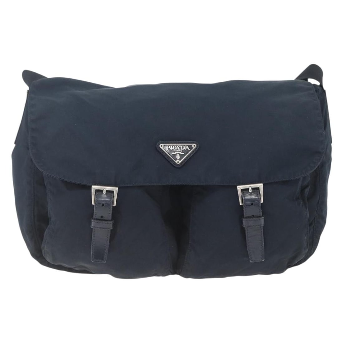 Prada Tessuto Navy Nylon Messenger Bag with Zip and Buckle: Prada Tessuto Navy Nylon Messenger Bag with Zip and Buckle This Prada Zip Buckle Messenger Bag is crafted from navy nylon and designed for unisex use. The bag features a functional zip and buckle clos