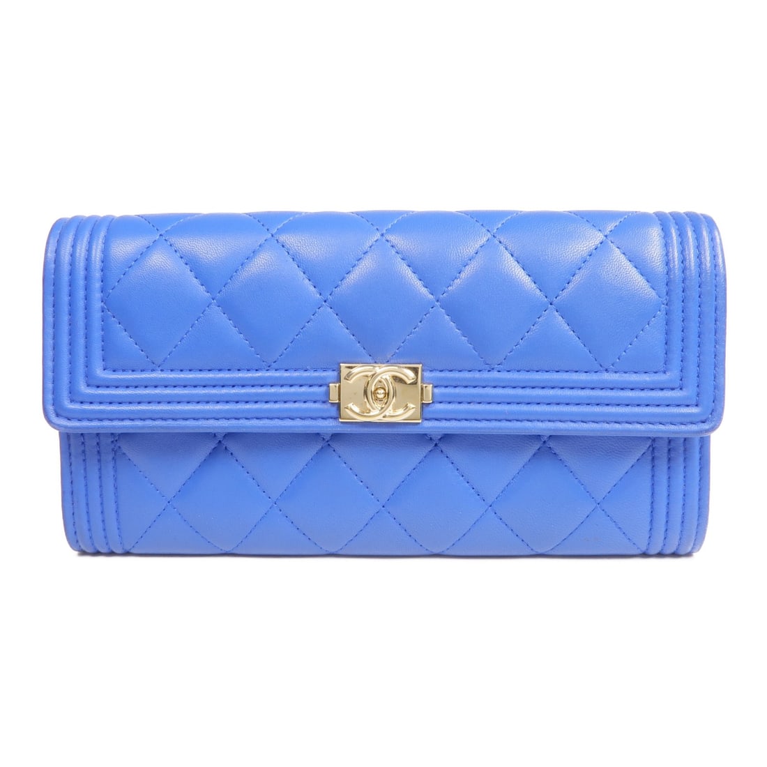 Blue Lambskin Boy Long Wallet by CHANEL with Gold CC Hardware: Blue Lambskin Boy Long Wallet by CHANEL with Gold CC Hardware This CHANEL Boy long wallet features a bifold design crafted from luxurious blue lambskin leather. The wallet is designed for regular use 