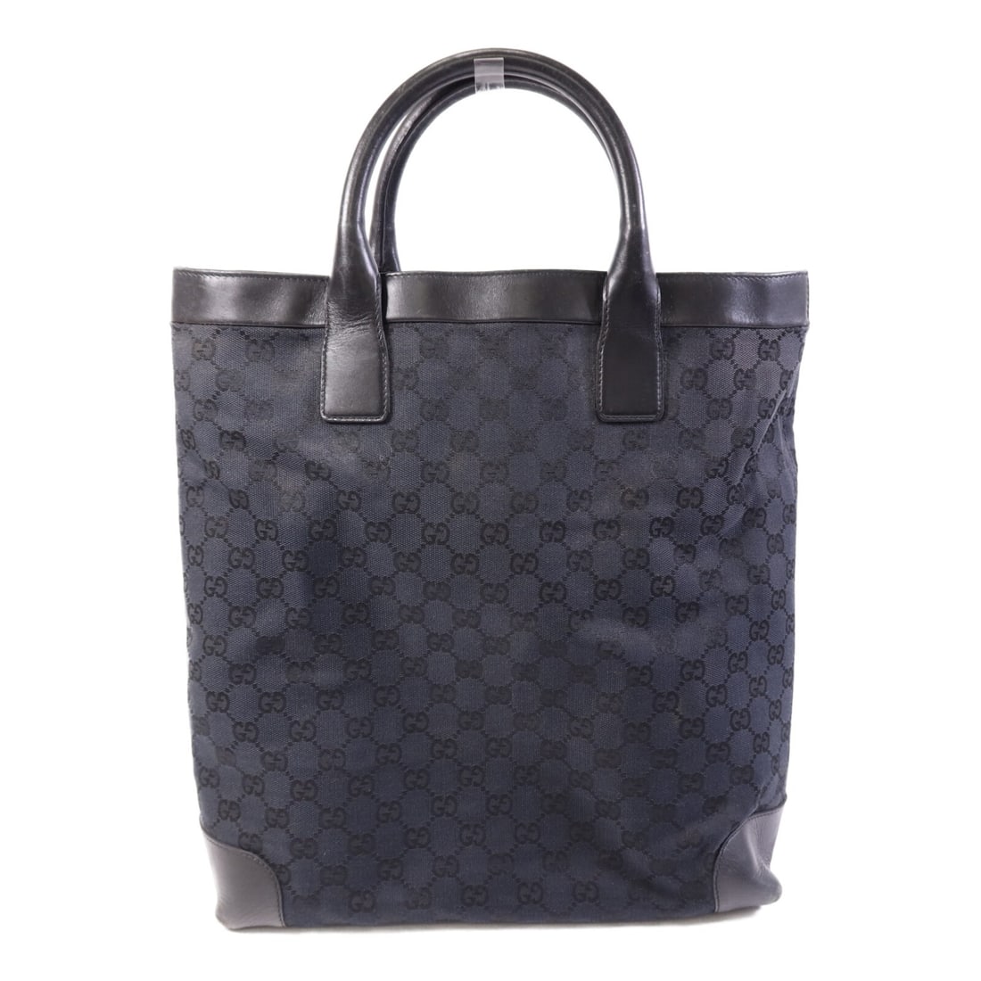 Black GG Canvas Large Tote from Gucci 002.1121: Black GG Canvas Large Tote from Gucci 002.1121 This Gucci GG tote bag features a black GG canvas exterior and offers ample space for daily essentials. Made in Italy, it presents a classic tote silhoue