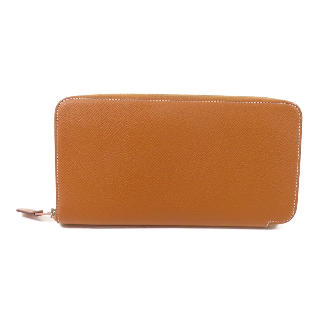Hermes Epsom Leather Brown Compact Round Wallet with Palladium Hardware: Hermes Epsom Leather Brown Compact Round Wallet with Palladium Hardware This compact wallet features Epsom leather in a rich brown shade, crafted in France. It is designed with palladium hardware and 