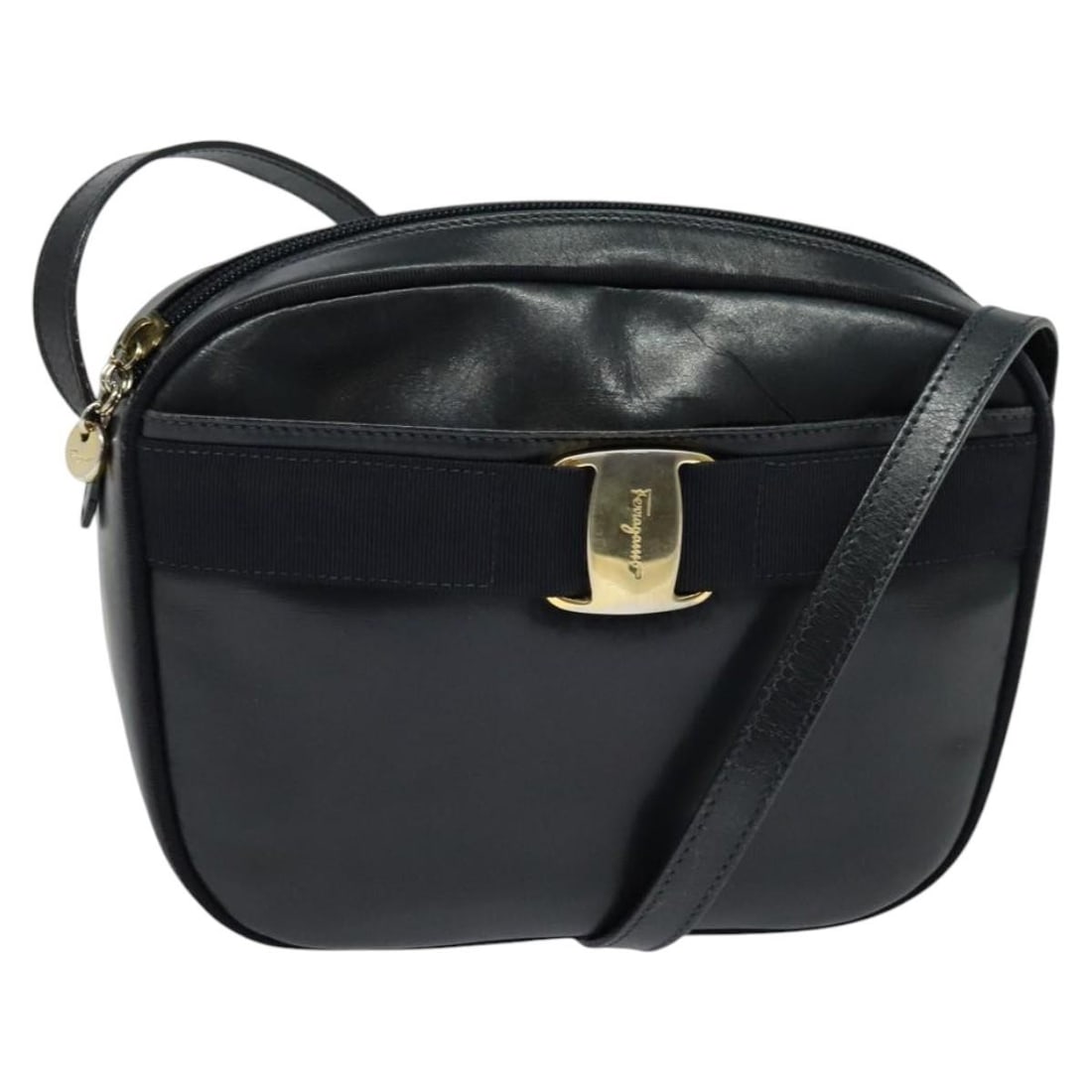 Navy Leather Women's Shoulder Purse by Salvatore Ferragamo Italy: Navy Leather Women's Shoulder Purse by Salvatore Ferragamo Italy This Salvatore Ferragamo shoulder bag is crafted from navy leather with gold-tone accents and is designed for women. Made in Italy, it 