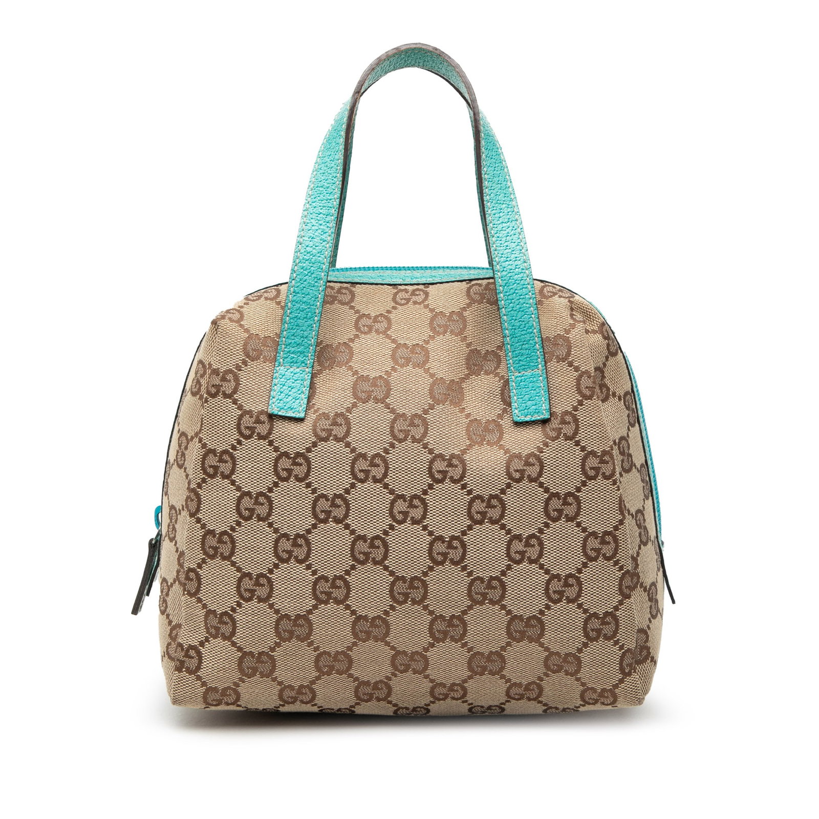 Mini GG Canvas Balthus Tofu Handbag with Leather Trim by Gucci: Mini GG Canvas Balthus Tofu Handbag with Leather Trim by Gucci The Gucci Mini GG Canvas Balthus Tofu Bag showcases a canvas body with leather trim, flat leather handles, a top zip closure, and an inte