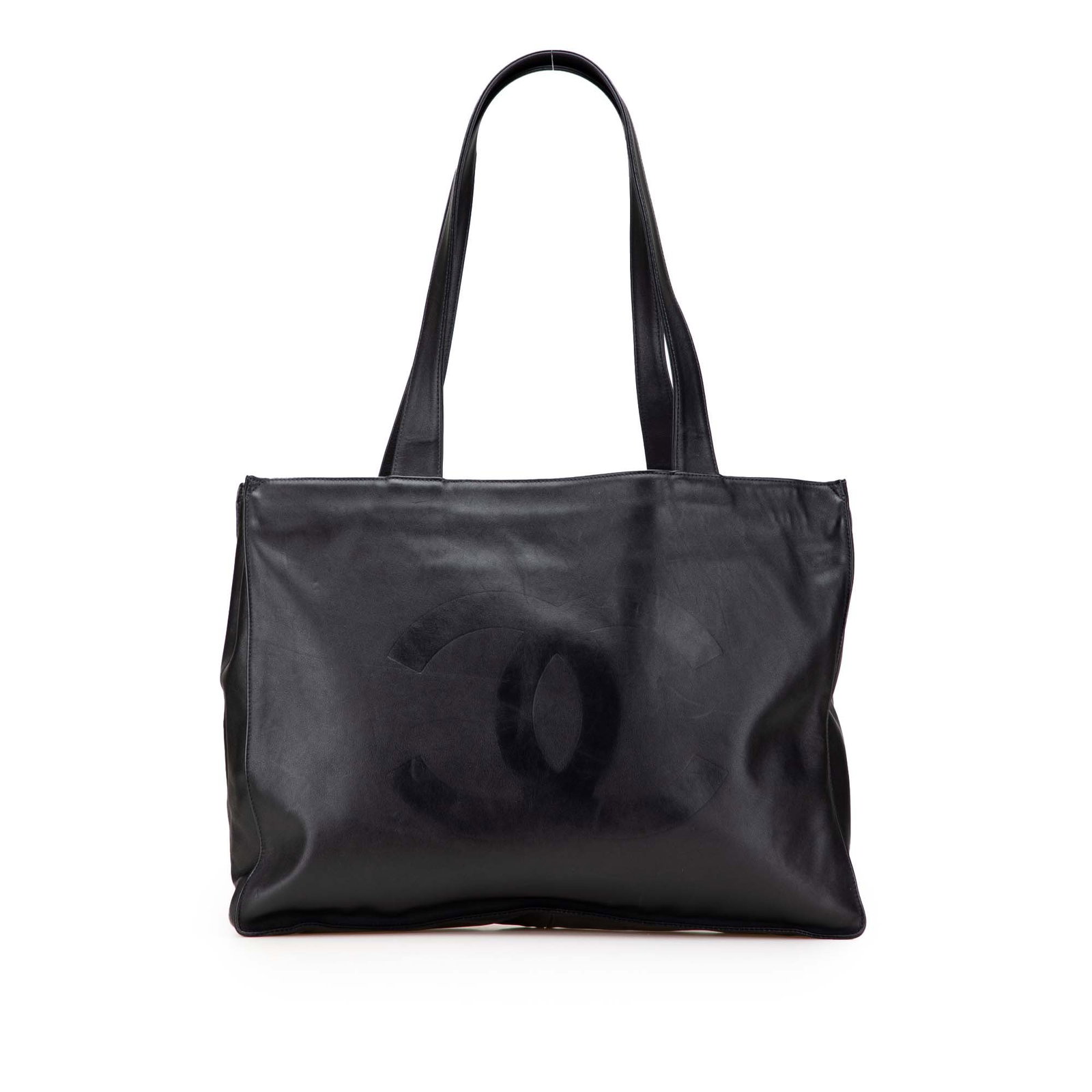Chanel CC Lambskin Tote Black Leather Bag with Zip Compartment: Chanel CC Lambskin Tote Black Leather Bag with Zip Compartment This Chanel CC Lambskin Tote combines elegance with functionality. Made from luxurious black lambskin leather, it features flat leather h