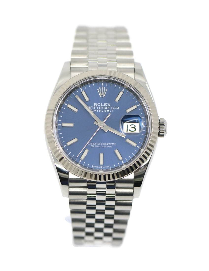 Rolex Datejust 36 Blue Dial Stainless Steel Automatic Watch 126234 with Box and Papers: Rolex Datejust 36 Blue Dial Stainless Steel Automatic Watch 126234 with Box and Papers This exquisite Rolex Datejust 36 wristwatch features a striking blue dial set within a durable stainless steel ca