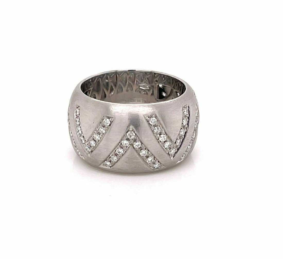 Damiani 18k White Gold Dome Band Ring with Diamonds Size 7: Damiani 18k White Gold Dome Band Ring with Diamonds Size 7 This Damiani wide dome band ring is crafted from 18k white gold and features sparkling diamonds with a total carat weight of 0.47. The ring i