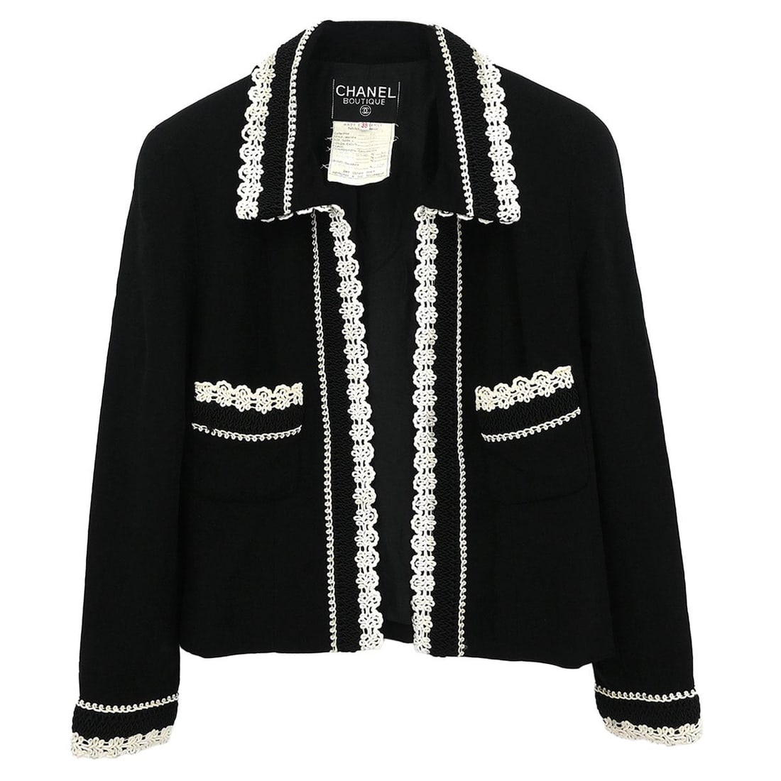 Black Wool Mid-Length Chanel Jacket Size 38 Single Breasted: Black Wool Mid-Length Chanel Jacket Size 38 Single Breasted This Chanel single-breasted jacket features a mid-length cut in black, crafted from a blend of 98% wool and 2% nylon. Designed with long sle