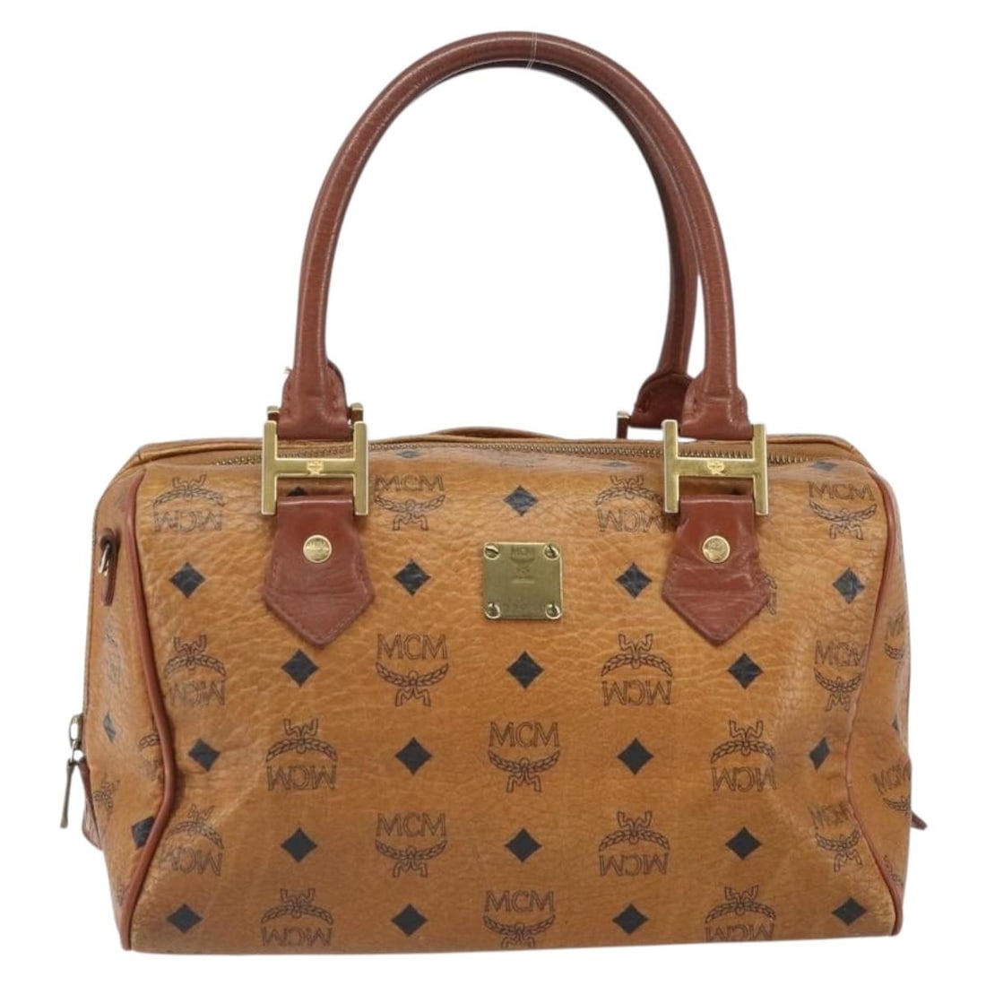 Brown Canvas and Leather MCM Visetos Logogramme Purse 25cm by 18cm by 14cm: Brown Canvas and Leather MCM Visetos Logogramme Purse 25cm by 18cm by 14cm The MCM Visetos Logogramme handbag is crafted from brown canvas with leather accents, designed for female use. It measures 25