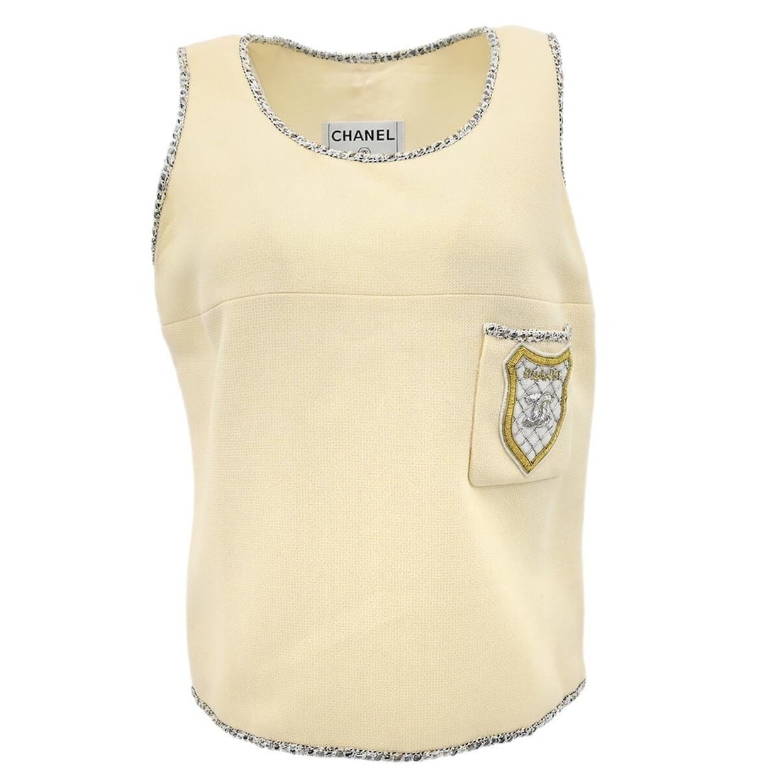 Chanel Ivory Sleeveless Wool Tank Top with Logo #42: Chanel Ivory Sleeveless Wool Tank Top with Logo #42 Elevate your casual wardrobe with this elegant Chanel sleeveless top in a timeless ivory shade. Crafted from 100% wool, this top features a classic 
