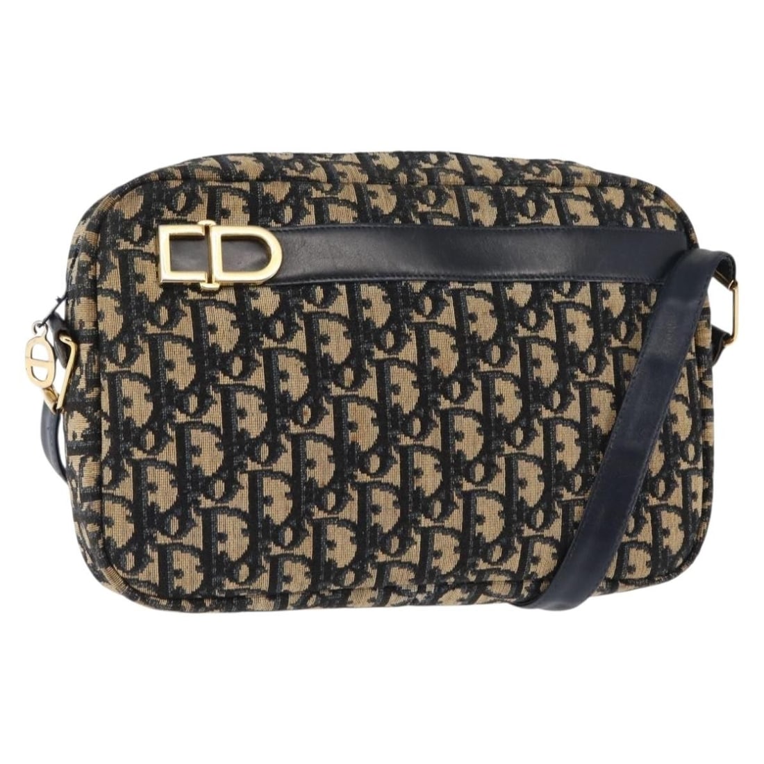 Christian Dior Trotter Diorissimo Navy Canvas Vintage Crossbody Shoulder Bag: Christian Dior Trotter Diorissimo Navy Canvas Vintage Crossbody Shoulder Bag This Christian Dior Vintage Trotter Crossbody Bag features the iconic Diorissimo coated canvas in navy, designed for women.