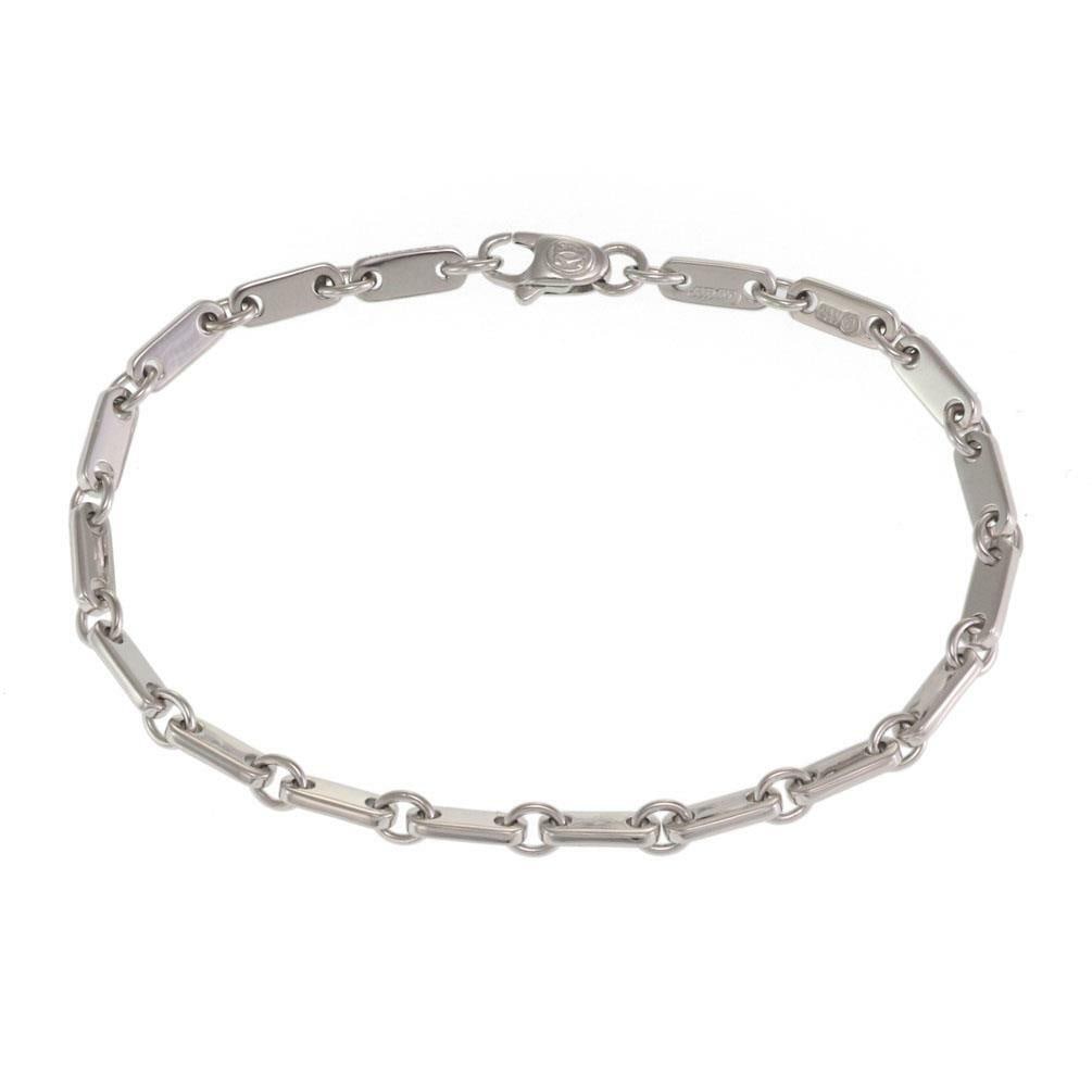 Cartier 18k White Gold Plaquette Figaro Link Bracelet 7" with Certificate: Cartier 18k White Gold Plaquette Figaro Link Bracelet 7" with Certificate Discover the elegance of this authentic Cartier bracelet from the Plaquette Figaro Collection. Crafted from 18k white gold, th