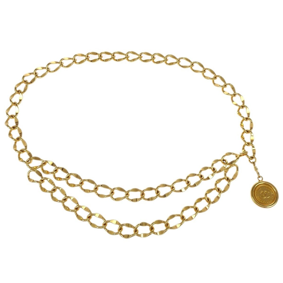 Gold Plated Chain Belt with Medallion Charm by Chanel Adjustable: Gold Plated Chain Belt with Medallion Charm by Chanel Adjustable This Chanel Medallion charm chain belt features a gold-plated finish and an adjustable design. Crafted for women, the belt showcases th