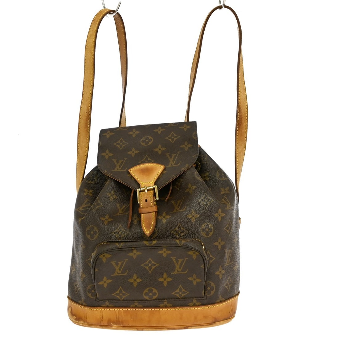Louis Vuitton Montsouris MM Monogram Canvas Medium Backpack M51136: Louis Vuitton Montsouris MM Monogram Canvas Medium Backpack M51136 This Louis Vuitton Montsouris MM backpack features the iconic brown monogram canvas leather exterior with a flap buckle and drawstrin