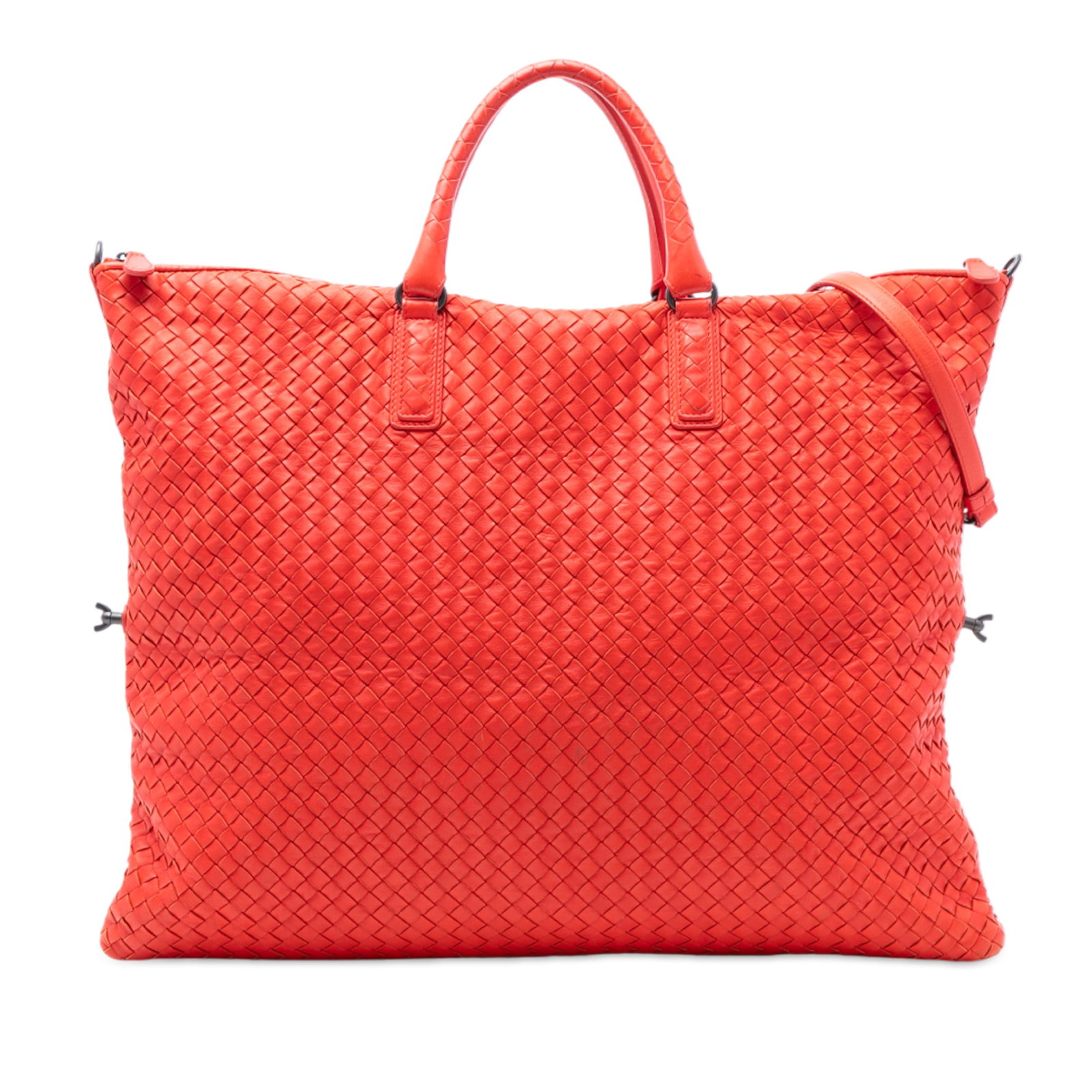 Red Maxi Intrecciato Leather Tote with Detachable Strap by Bottega Veneta: Red Maxi Intrecciato Leather Tote with Detachable Strap by Bottega Veneta This Bottega Veneta Maxi Nappa Intrecciato Convertible Tote is crafted from woven leather in a distinctive red hue. It feature