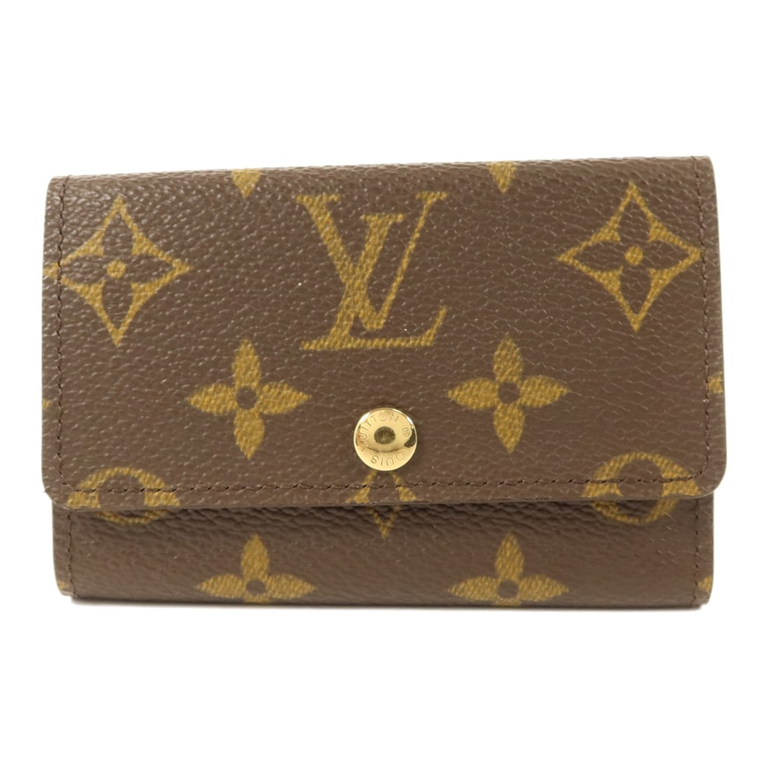 Louis Vuitton Monogram Brown Six Key Holder with Gold Hardware M62630: Louis Vuitton Monogram Brown Six Key Holder with Gold Hardware M62630 This Louis Vuitton 6 key holder features the iconic monogram pattern in brown PVC coated canvas with gold-tone hardware. Designed 