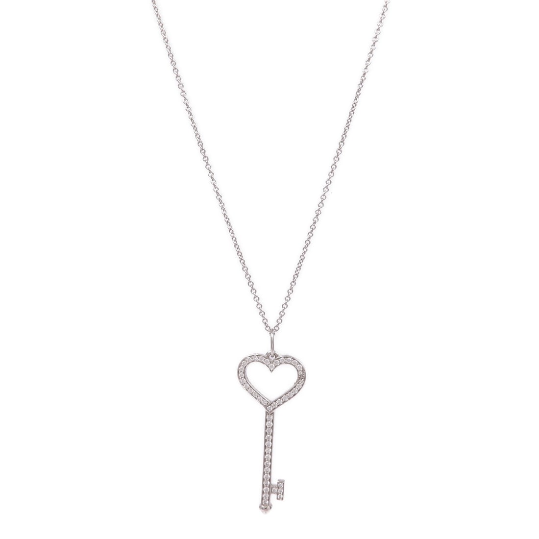 Platinum Tiffany Heart Key Pendant Necklace With Diamonds PT950: Platinum Tiffany Heart Key Pendant Necklace With Diamonds PT950 This Tiffany & Co. necklace features a heart key pendant crafted in PT950 platinum and set with diamonds. The piece showcases a classic 