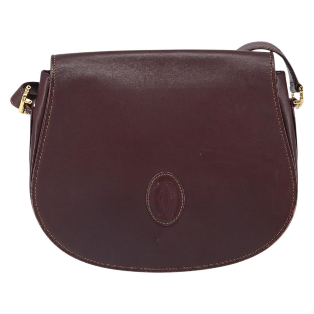 Must de Cartier Burgundy Leather Shoulder Bag for Women: Must de Cartier Burgundy Leather Shoulder Bag for Women This Must de Cartier Shoulder Bag is crafted from burgundy leather and designed for women. The bag features a structured silhouette with a shoul