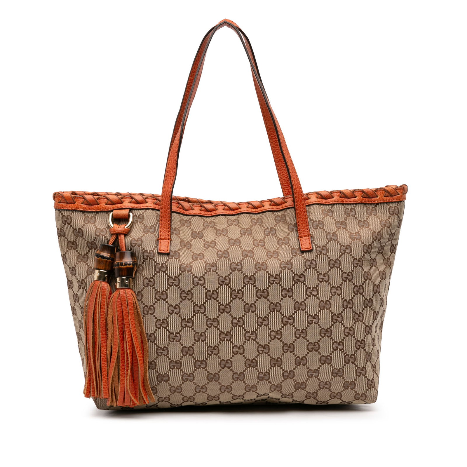 Gucci GG Canvas Tote with Bamboo Tassel and Leather Trim: Gucci GG Canvas Tote with Bamboo Tassel and Leather Trim This Gucci Medium GG Canvas Bamboo Tassel Tote features a beige canvas body with leather trim and bamboo-accented tassels. It has flat leather 