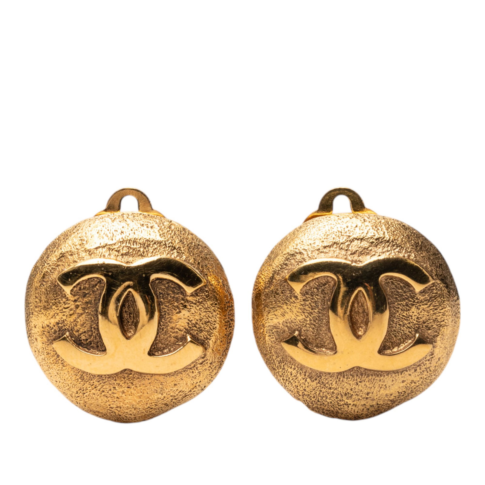 Chanel CC Logo Gold Tone Metal Round Clip Earrings: Chanel CC Logo Gold Tone Metal Round Clip Earrings These Chanel round clip-on earrings feature gold tone metal bodies with the iconic CC design. Crafted in France, they are designed with secure back c