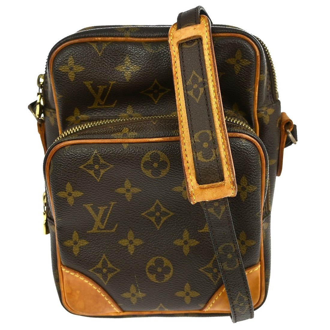 Amazone Crossbody Monogram Canvas Bag by Louis Vuitton: Amazone Crossbody Monogram Canvas Bag by Louis Vuitton This pre-owned Louis Vuitton Amazone Bag features the iconic Monogram canvas in brown, designed as a crossbody for women. The bag shows vintage c