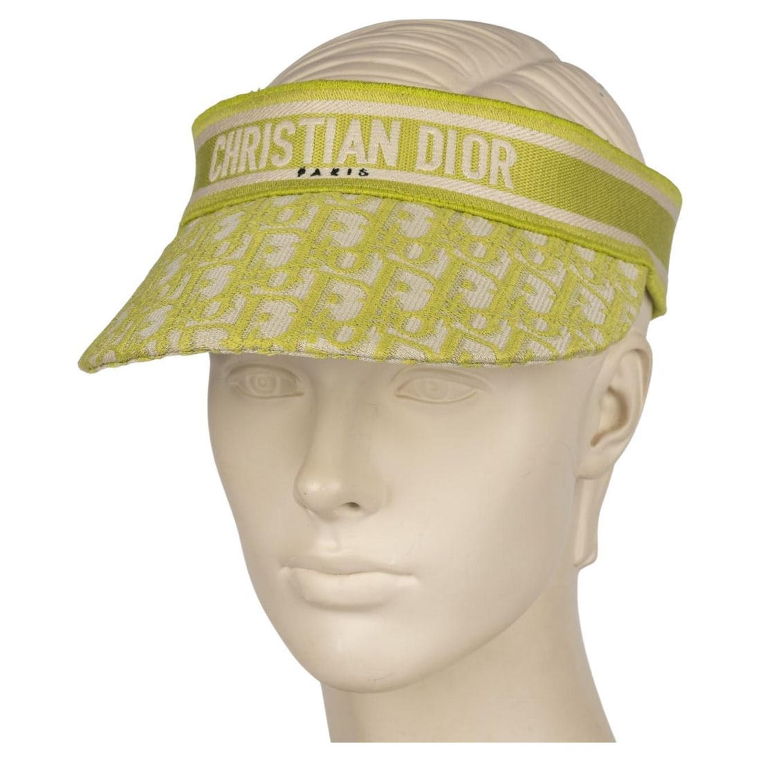 Christian Dior Lime Oblique Visor with Signature Band: Christian Dior Lime Oblique Visor with Signature Band Introducing the Christian Dior Oblique Visor in vibrant lime, a stylish accessory that embodies modern elegance. This visor showcases the iconic C