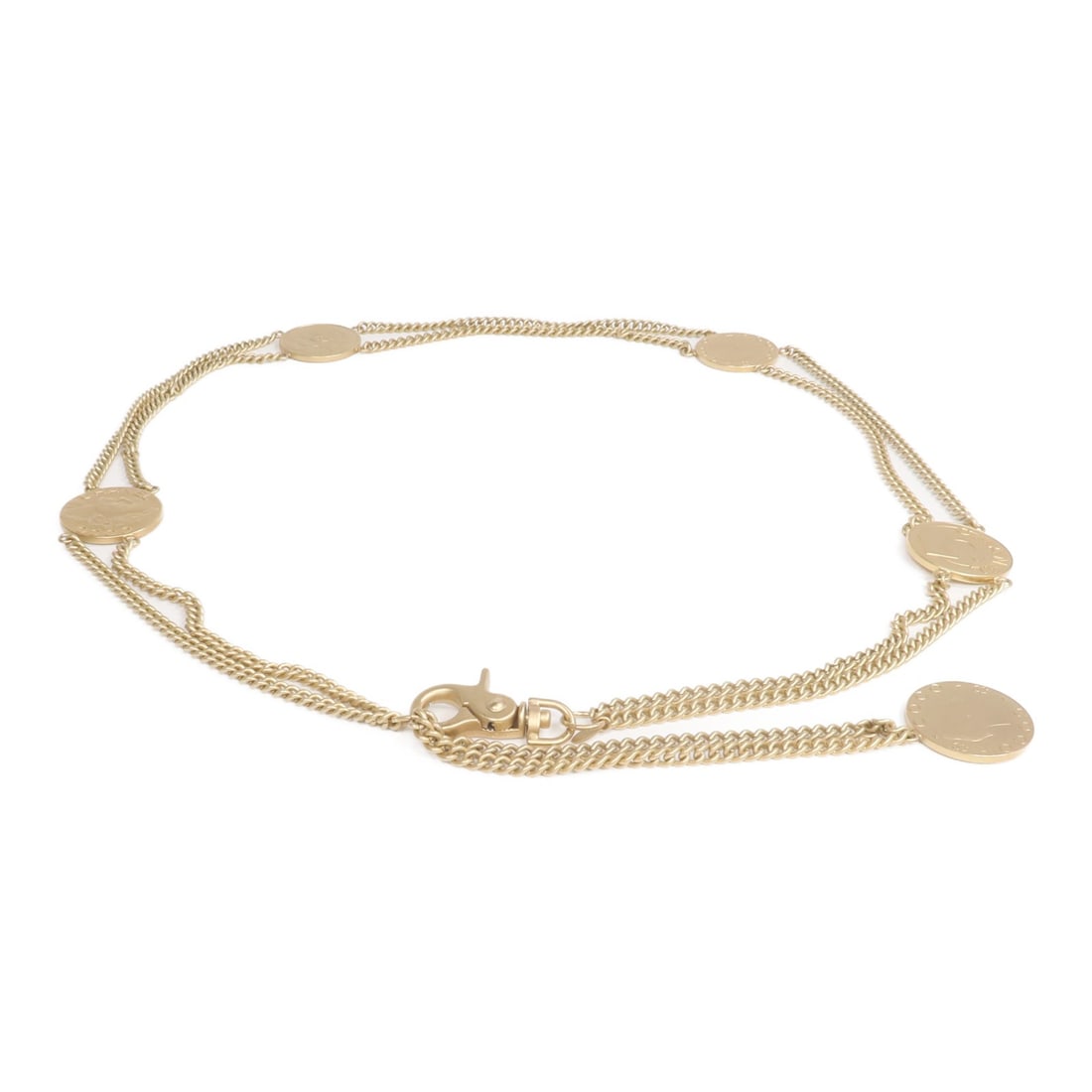 Gold Vintage Chain Belt by Chanel with CC Logo: Gold Vintage Chain Belt by Chanel with CC Logo This CHANEL CC vintage chain belt features a gold-tone metal design, offering a classic and elegant accessory for women. Crafted in France, it is in very