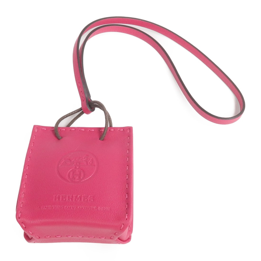Rose Extreme Lambskin Bag Charm by Hermes: Rose Extreme Lambskin Bag Charm by Hermes This Hermes bag charm is crafted from luxurious lambskin (sheep leather) in a striking red color. Designed for women, it features a stylish and vibrant look, 