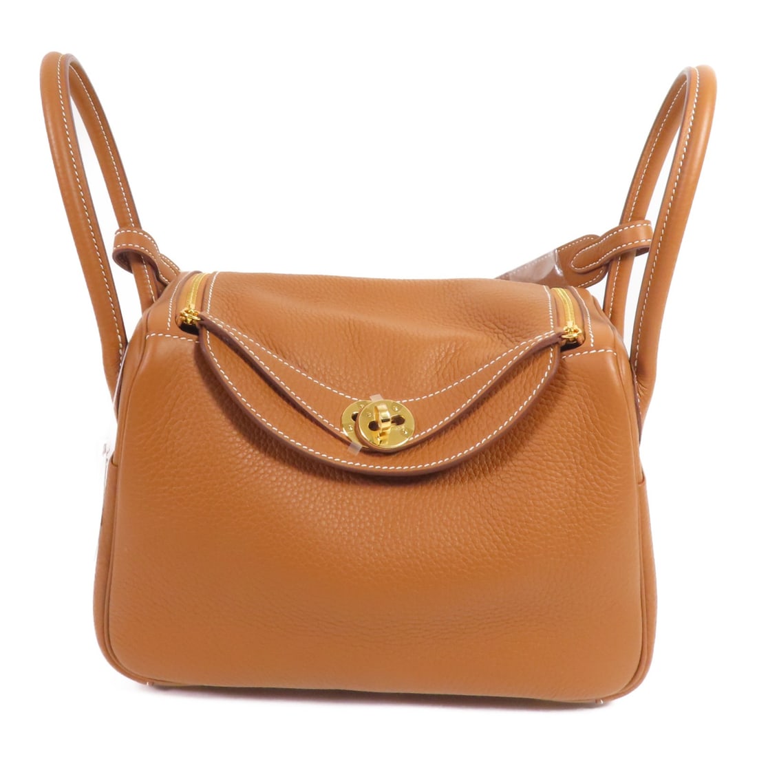 Hermes Lindy 26 Brown Clemence Leather Shoulder Bag with Gold Hardware: Hermes Lindy 26 Brown Clemence Leather Shoulder Bag with Gold Hardware This Hermes Lindy 26 two-way shoulder bag is crafted from Clemence calfskin leather in brown. The bag features a versatile design