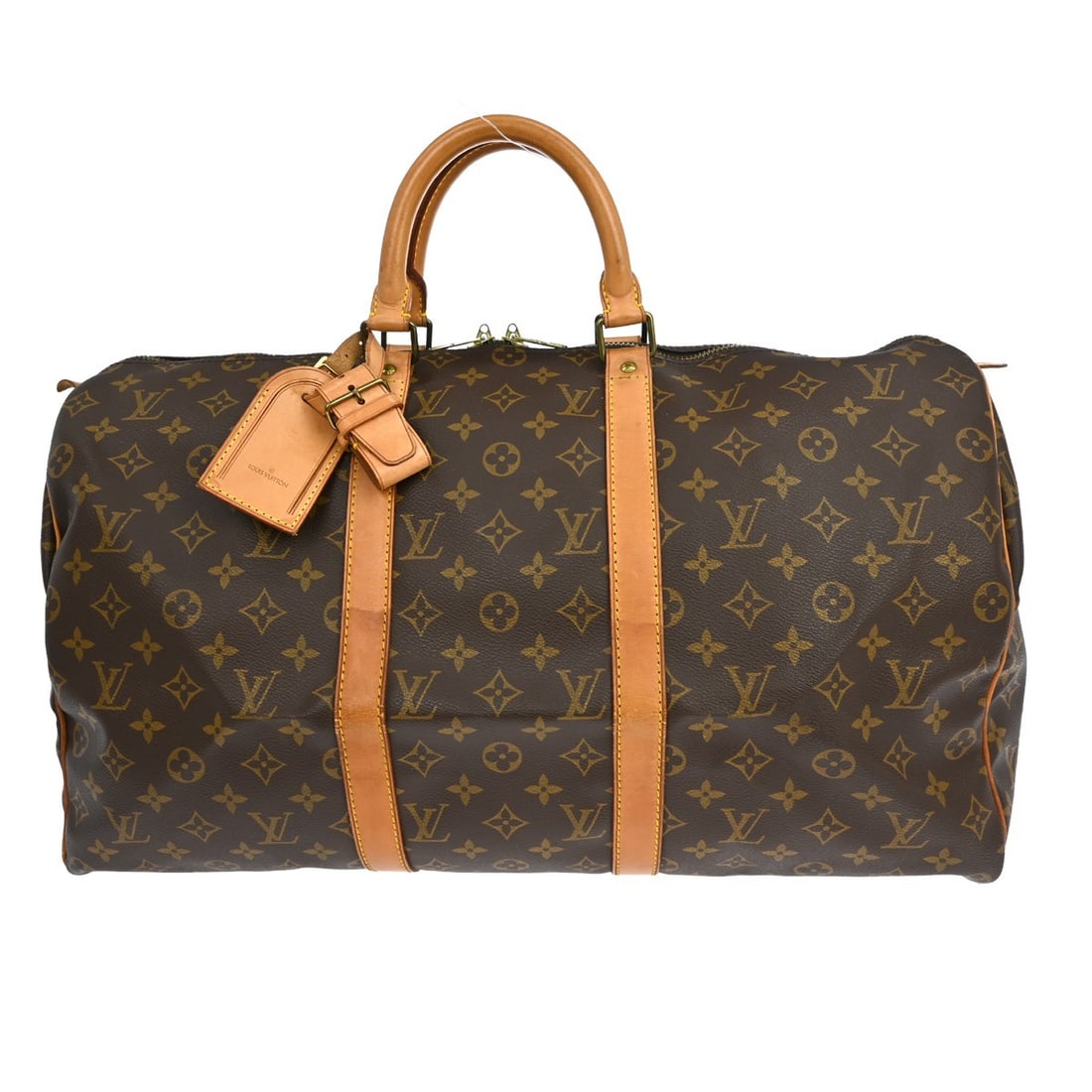 Keepall Monogram Canvas Travel Bag by Louis Vuitton Brown 50cm: Keepall Monogram Canvas Travel Bag by Louis Vuitton Brown 50cm This Louis Vuitton Keepall Bag features the iconic monogram canvas in brown, designed for female use. The bag is in fair, used condition 