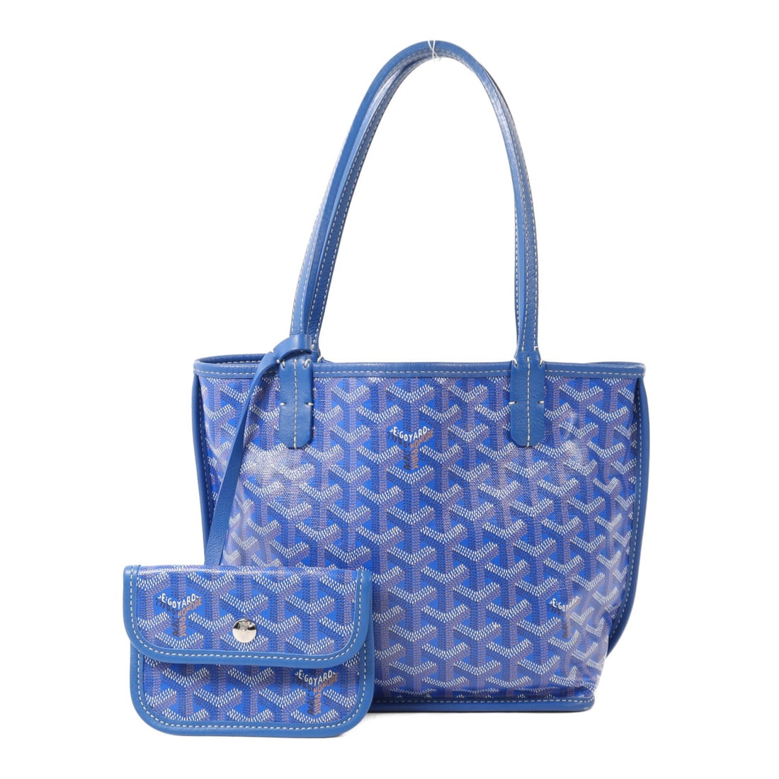 Blue Anjou Mini Tote by Goyard in Coated Canvas with Silver Hardware: Blue Anjou Mini Tote by Goyard in Coated Canvas with Silver Hardware This Goyard Anjou Mini Tote Bag features a blue PVC coated canvas exterior and is designed for women. The tote offers a regular siz