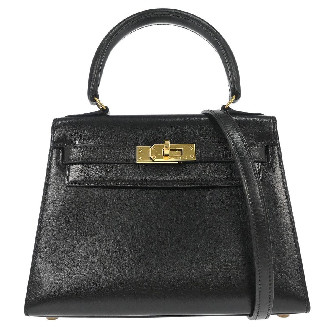Hermes Mini Kelly 20 Black Box Calf Leather Top Handle Bag with Gold Hardware: Hermes Mini Kelly 20 Black Box Calf Leather Top Handle Bag with Gold Hardware This Hermes Mini Kelly 20 handbag is crafted from black Box Calf leather with a coated finish. It features a small size, a