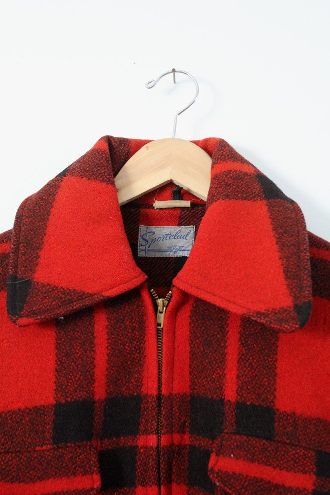 1940s Vintage Sportclad Wool Plaid Coat with Six Pockets: 1940s Vintage Sportclad Wool Plaid Coat with Six Pockets Discover a timeless piece from the 1940s with this Vintage Sportclad Wool Plaid Coat. This American classic features a stylish wool plaid patte