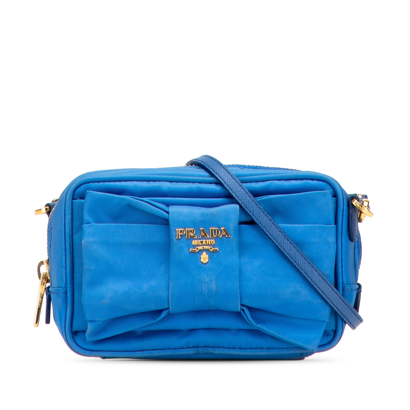 Prada Tessuto Fiocco Bow Blue Nylon Crossbody Bag: Prada Tessuto Fiocco Bow Blue Nylon Crossbody Bag The Prada Tessuto Fiocco Bow Crossbody bag is a stylish accessory crafted from durable nylon in a striking blue color. It features a flat strap for co